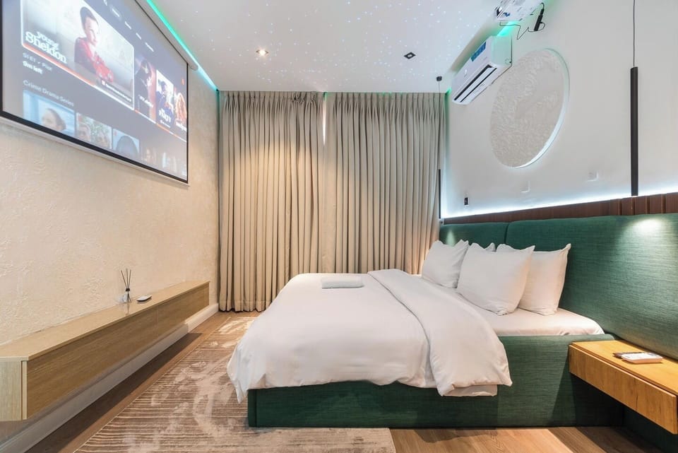 Economy Room, Balcony, City View | Desk, laptop workspace, blackout drapes, soundproofing