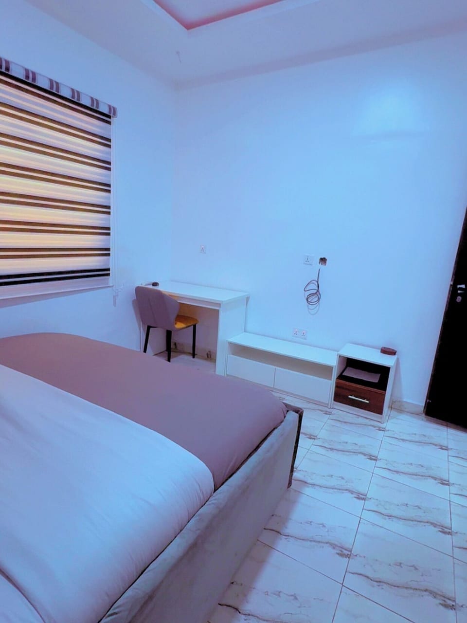 Deluxe Apartment, Balcony, City View | In-room safe, desk, laptop workspace, blackout drapes