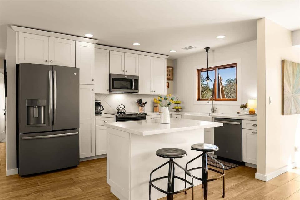 Fully equipped kitchen with island and bar seating