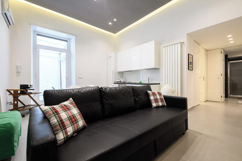 Apartment (1 Bedroom) | Living area | 32-inch TV with cable channels