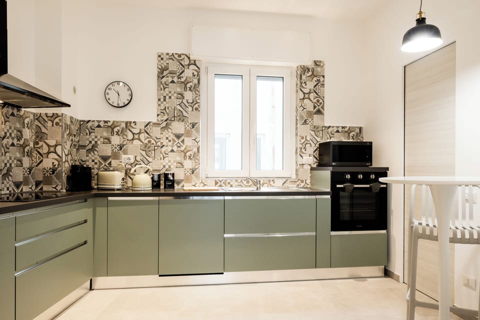 Apartment (2 Bedrooms) | Private kitchen | Microwave, oven, stovetop, dishwasher