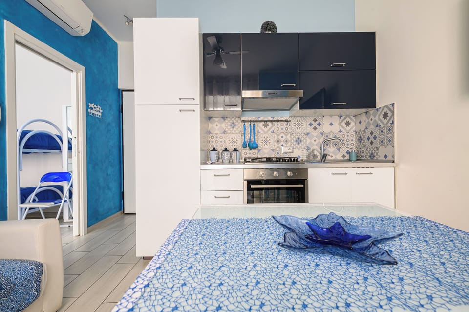 Apartment (1 Bedroom) | Living area | TV
