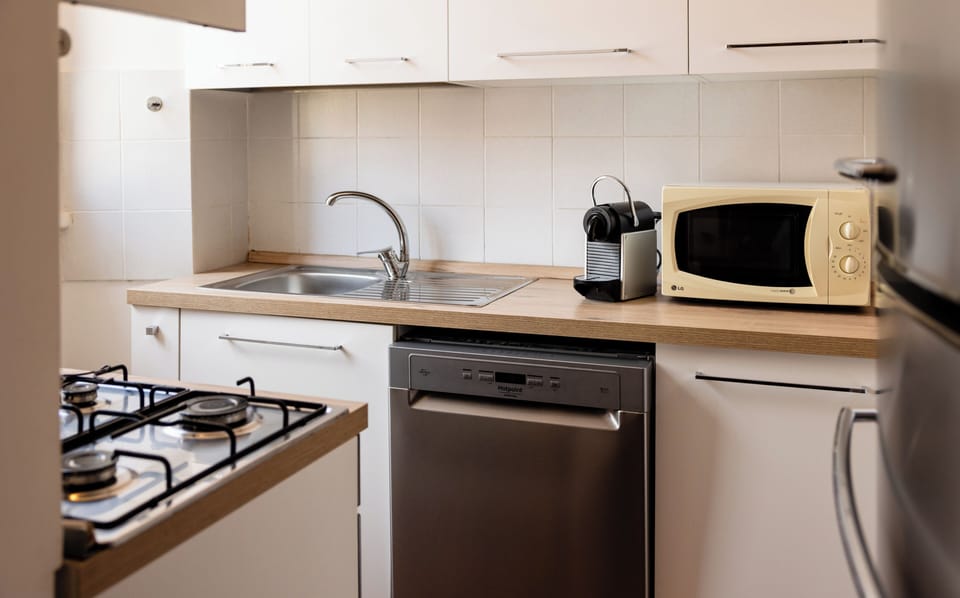 Apartment (1 Bedroom) | Private kitchen | Microwave, stovetop, espresso maker, electric kettle