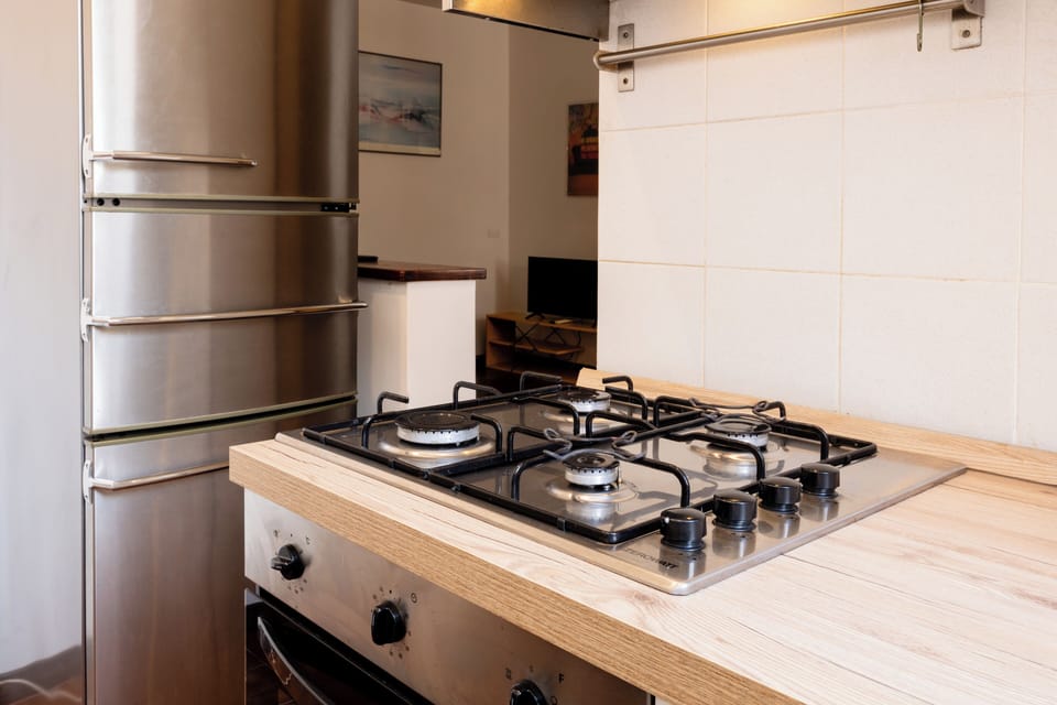 Apartment (1 Bedroom) | Private kitchen | Microwave, stovetop, espresso maker, electric kettle