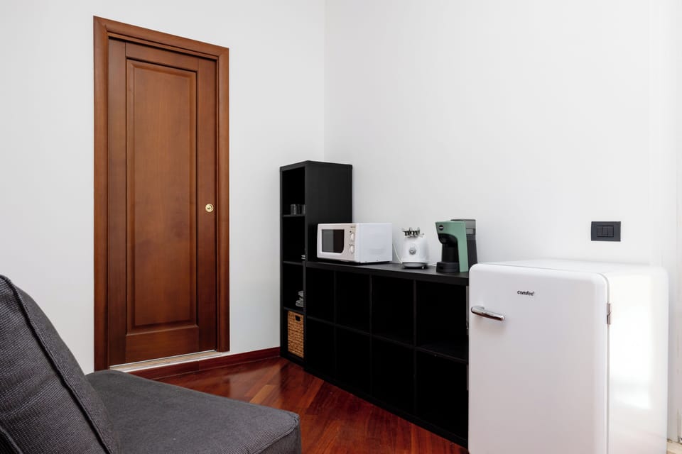 Apartment (1 Bedroom) | Living area | 32-inch Smart TV with cable channels