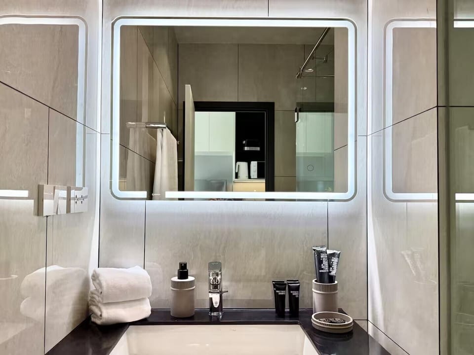 Standard Studio | Bathroom | Hair dryer, towels, soap, shampoo