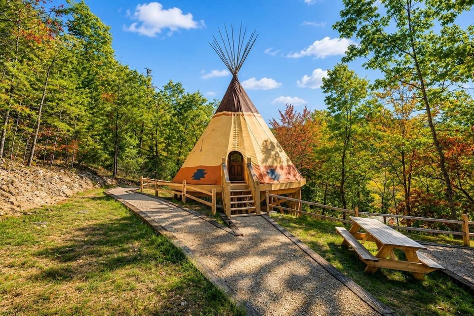 Luxury Smoky Mountain glamping tepee nestled inside gated Parkside Resort, offering a unique mountain retreat just minutes from Dollywood, Pigeon Forge Parkway, and top Smoky Mountain attractions.
