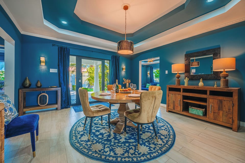 Spacious dining room with natural light and outdoor access