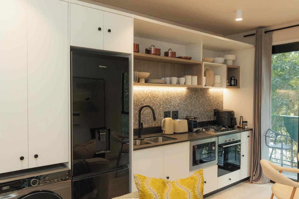 Luxury Apartment | Private kitchen | Coffee/tea maker, electric kettle, cookware/dishes/utensils, freezer