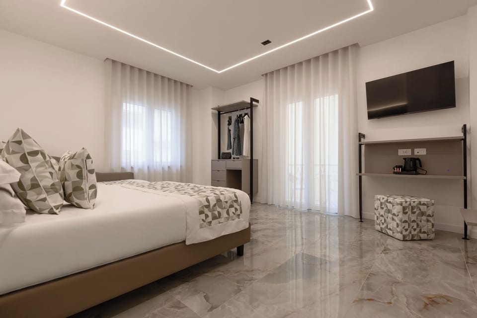 Deluxe Triple Room, Balcony, City View | Free WiFi