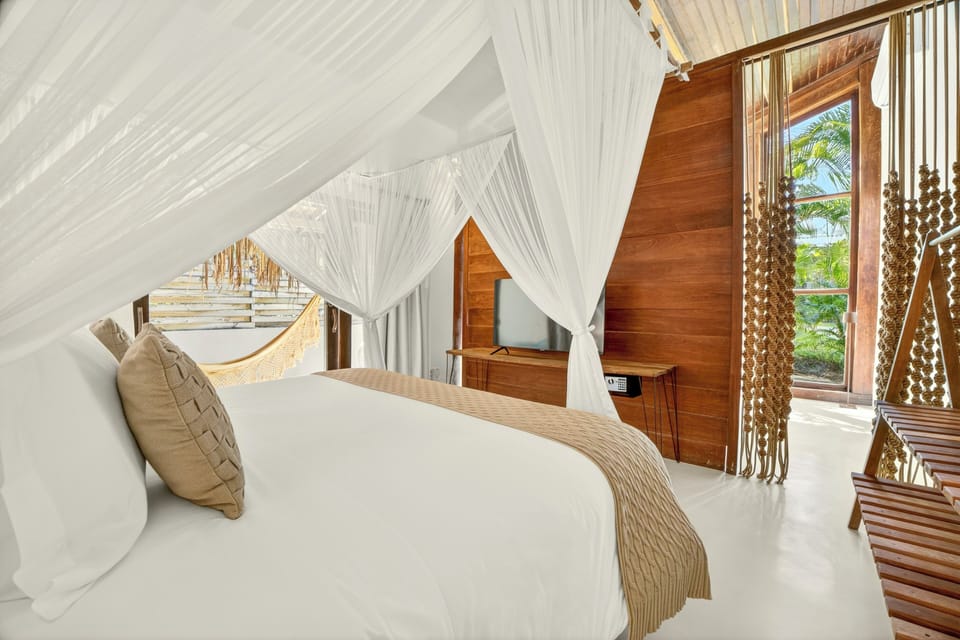 Deluxe Quadruple Room, Lanai, Garden View | Hypo-allergenic bedding, free WiFi