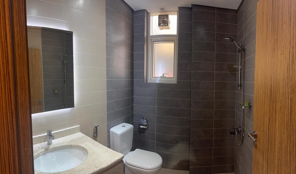 Standard Studio | Bathroom | Shower, slippers, towels, soap