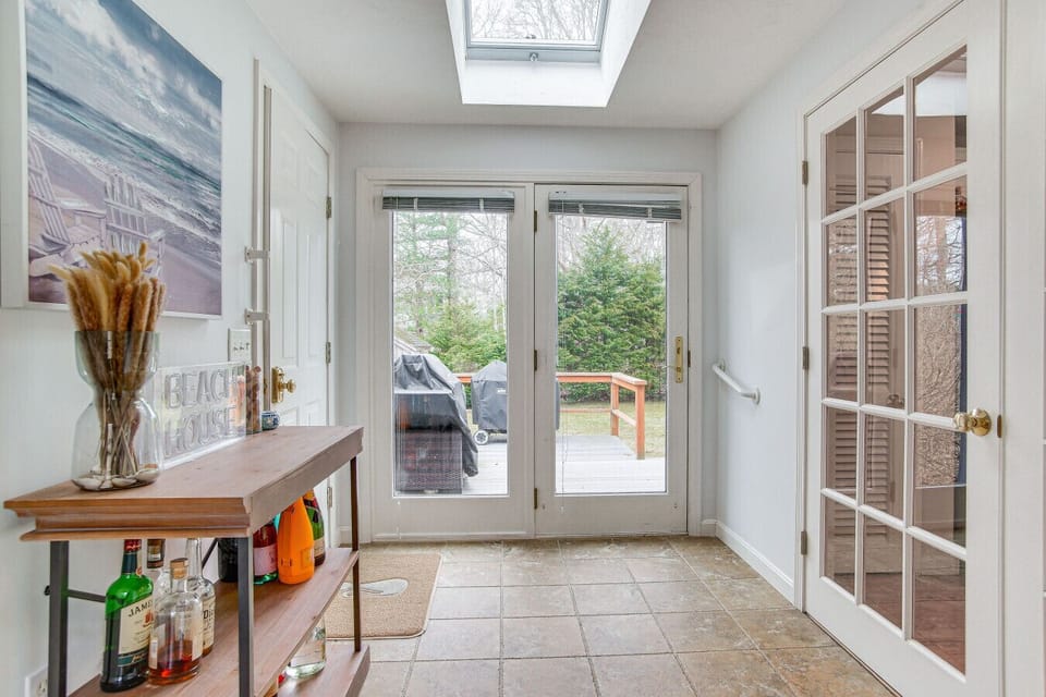 Entrance | French Doors | Deck Access & Tile Flooring