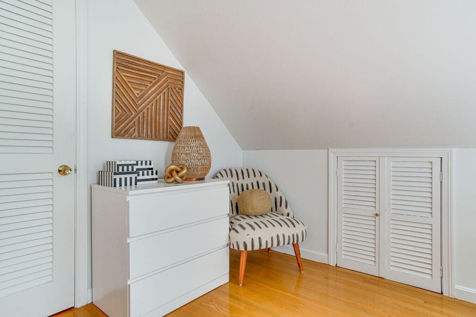 Bedroom 4 | Storage Dresser | Accent Chair & Louvered Doors