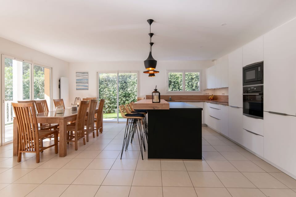 Enjoy meals around the large dining table, perfect for gatherings or celebrations.