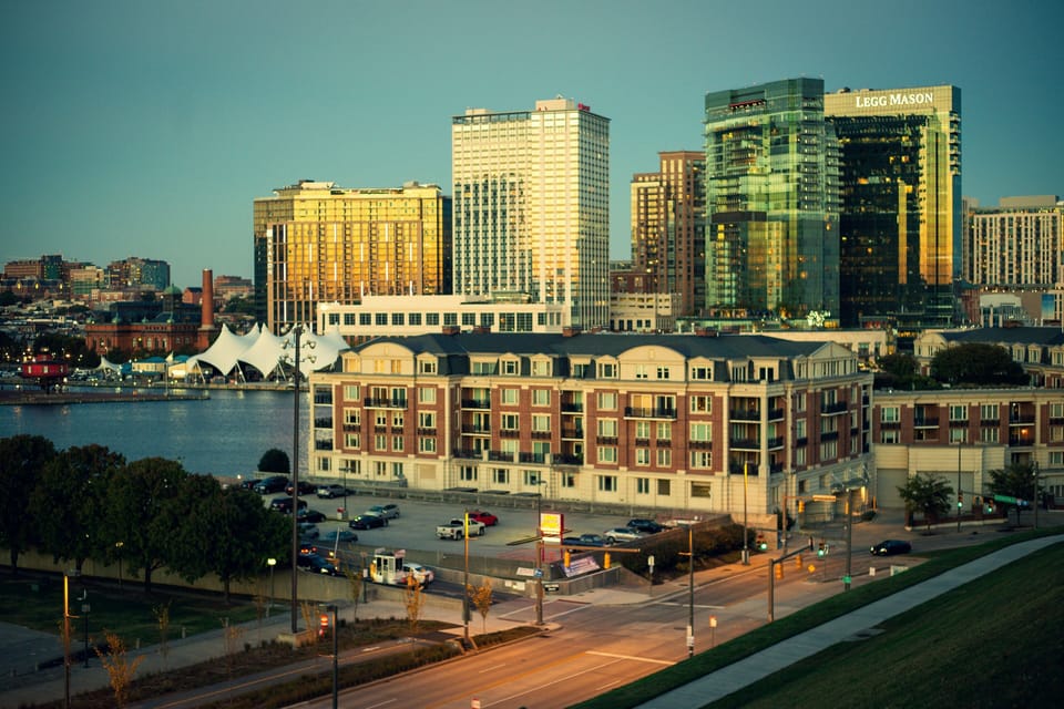 Vibrant waterfront skyline at sunset