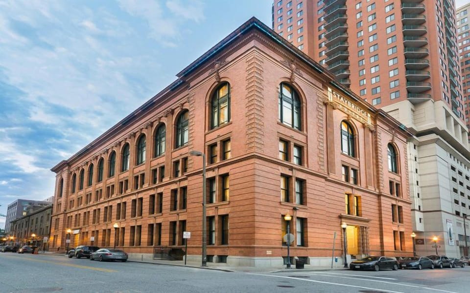 Charming brick exterior blends historic elegance with modern amenities.