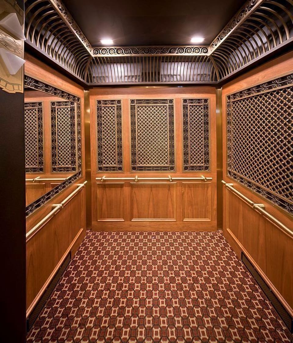 Elegant elevator showcasing classic design and luxurious finishes.