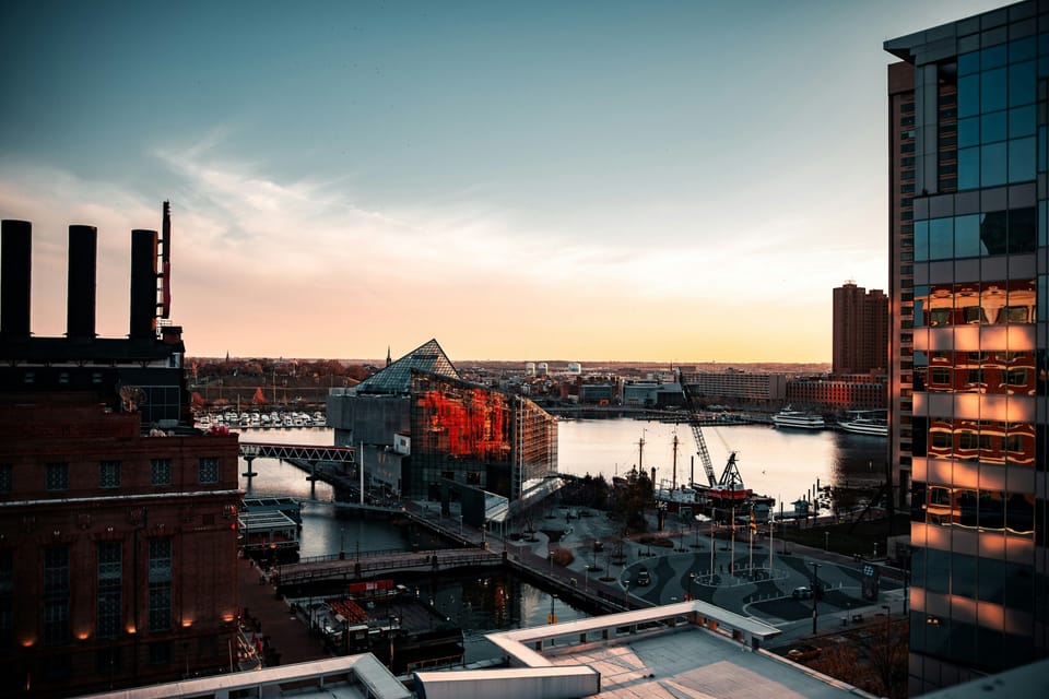 Iconic waterfront architecture reflecting the sunset glow