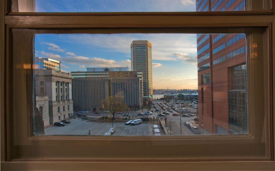 Scenic view showcasing a vibrant city skyline and blue skies.