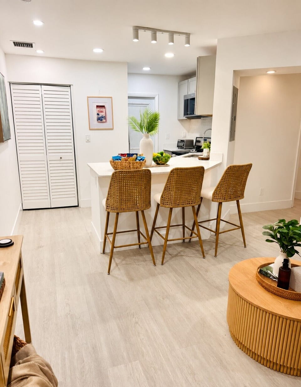 Kitchen island with bar seating, perfect for meals, coffee, or spending time together.
