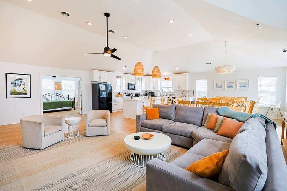 Expansive great room combining living, dining, and kitchen—perfect for group gatherings and entertaining.