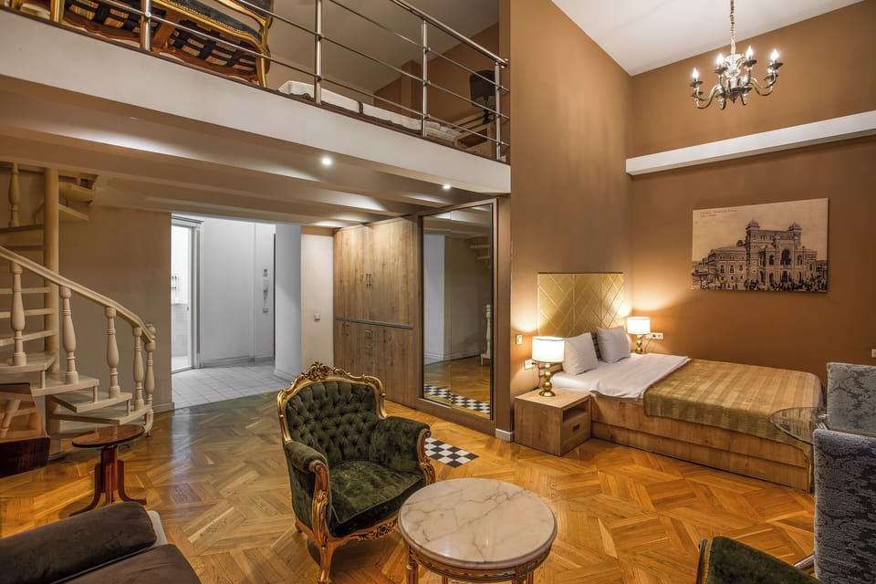 Family Apartment, Balcony, City View | In-room safe, desk, soundproofing, iron/ironing board