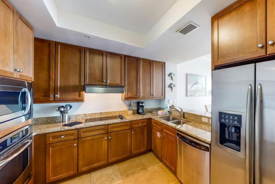Condo, Multiple Beds (Indigo East 2003) | Private kitchen