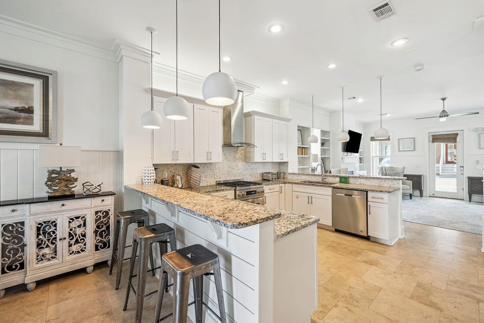 Your dream kitchen awaits with granite countertops, premium appliances, and spacious island perfect for cooking memorable meals together.