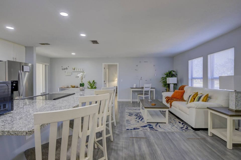 Living Room: An uncluttered environment that focuses on comfort and easy entertaining.