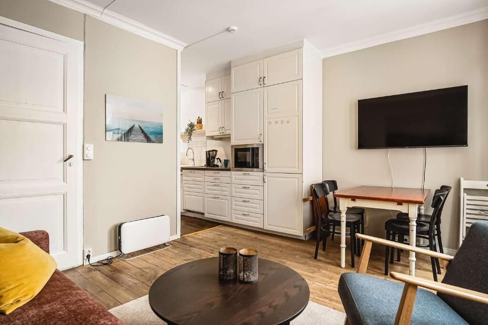Cozy living space with kitchen view
