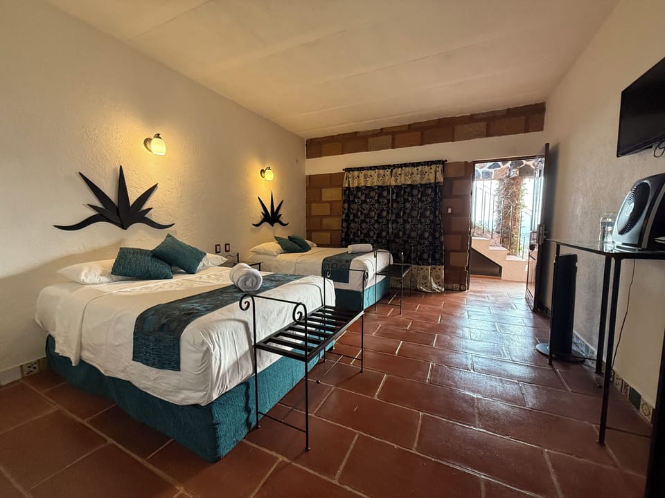 Deluxe Double Room, Mountain View | Blackout drapes, WiFi (free), bed sheets