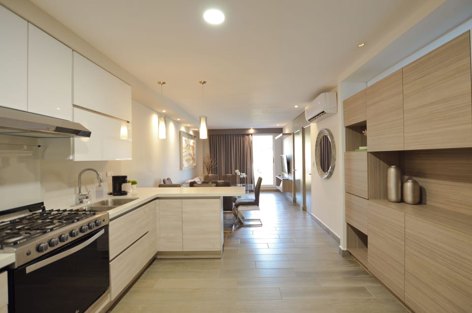 Suite, City View | Private kitchen | Full-size fridge, microwave, stovetop, toaster