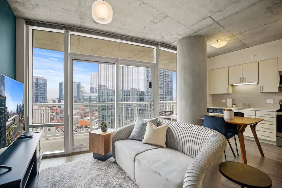 Sip coffee by panoramic windows in this open-concept retreat.