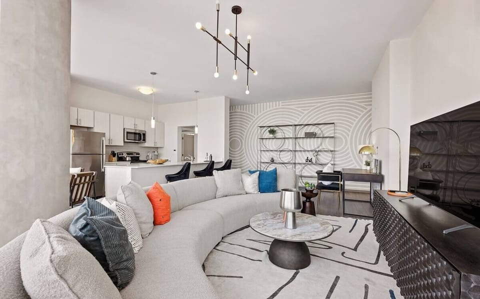 Host friends in the open living space with designer finishes.