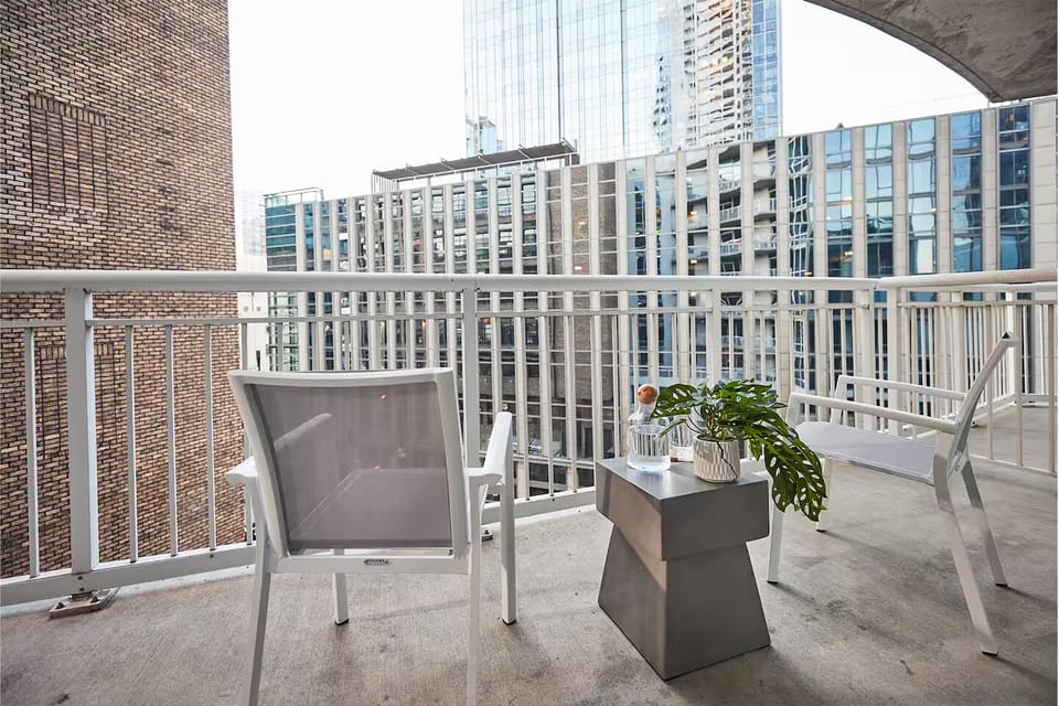 Sip morning coffee outside while the city hums below.