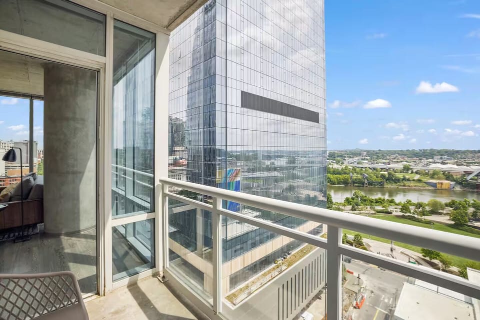 Step onto the balcony and savor sweeping skyline views.