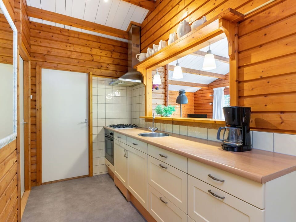 Countertop, Cabinetry, Furniture, Building, Property, Drawer, Kitchen, Wood, Tap, Interior Design
