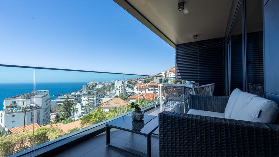 Unwind on the stylish balcony lounge at Vicens XXI 9 by LovelyStay, featuring breathtaking ocean views, perfect for relaxing evenings, morning coffee, and enjoying Madeira’s mild climate in comfort.
#BalconyView #OceanLiving #MadeiraViews