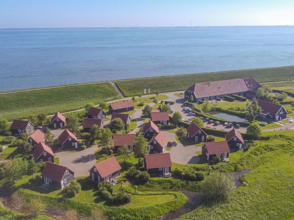 Water, Sky, Plant, Ecoregion, Building, House, Natural Landscape, Land Lot, Urban Design, Coastal And Oceanic Landforms