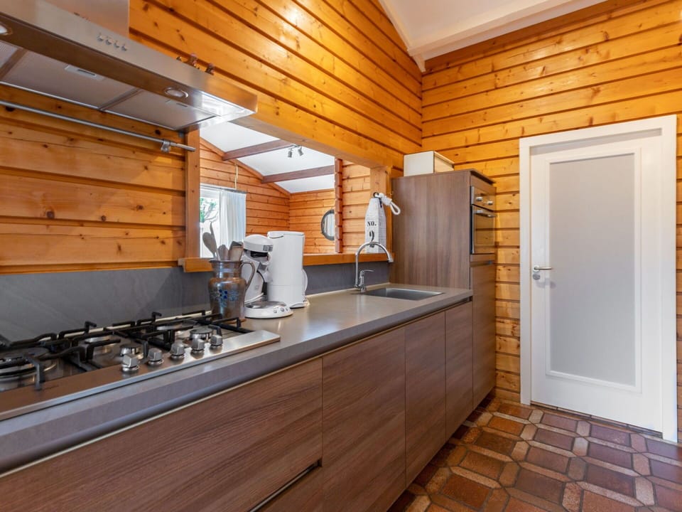 Tap, Cabinetry, Countertop, Property, Plumbing Fixture, Kitchen Sink, Wood, Sink, Kitchen, Interior Design