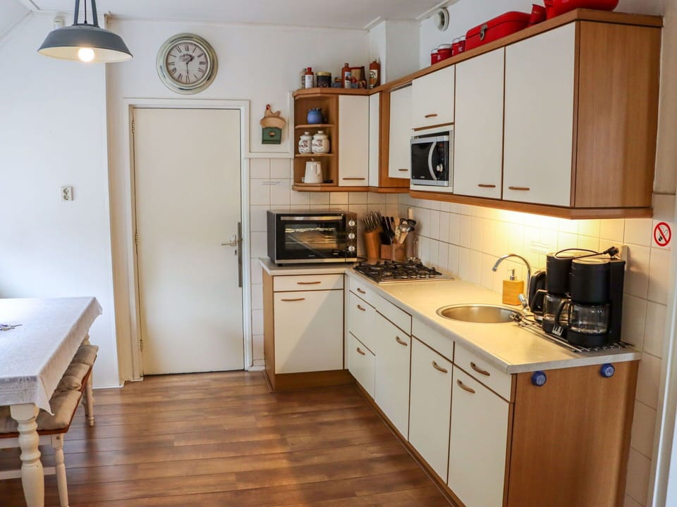 Cabinetry, Countertop, Furniture, Sink, Kitchen Sink, Kitchen Stove, Kitchen Appliance, Kitchen, Wood, Interior Design
