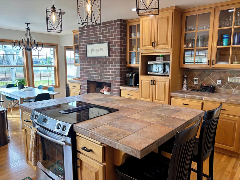 Spacious, fully stocked kitchen with dine in seating and large island