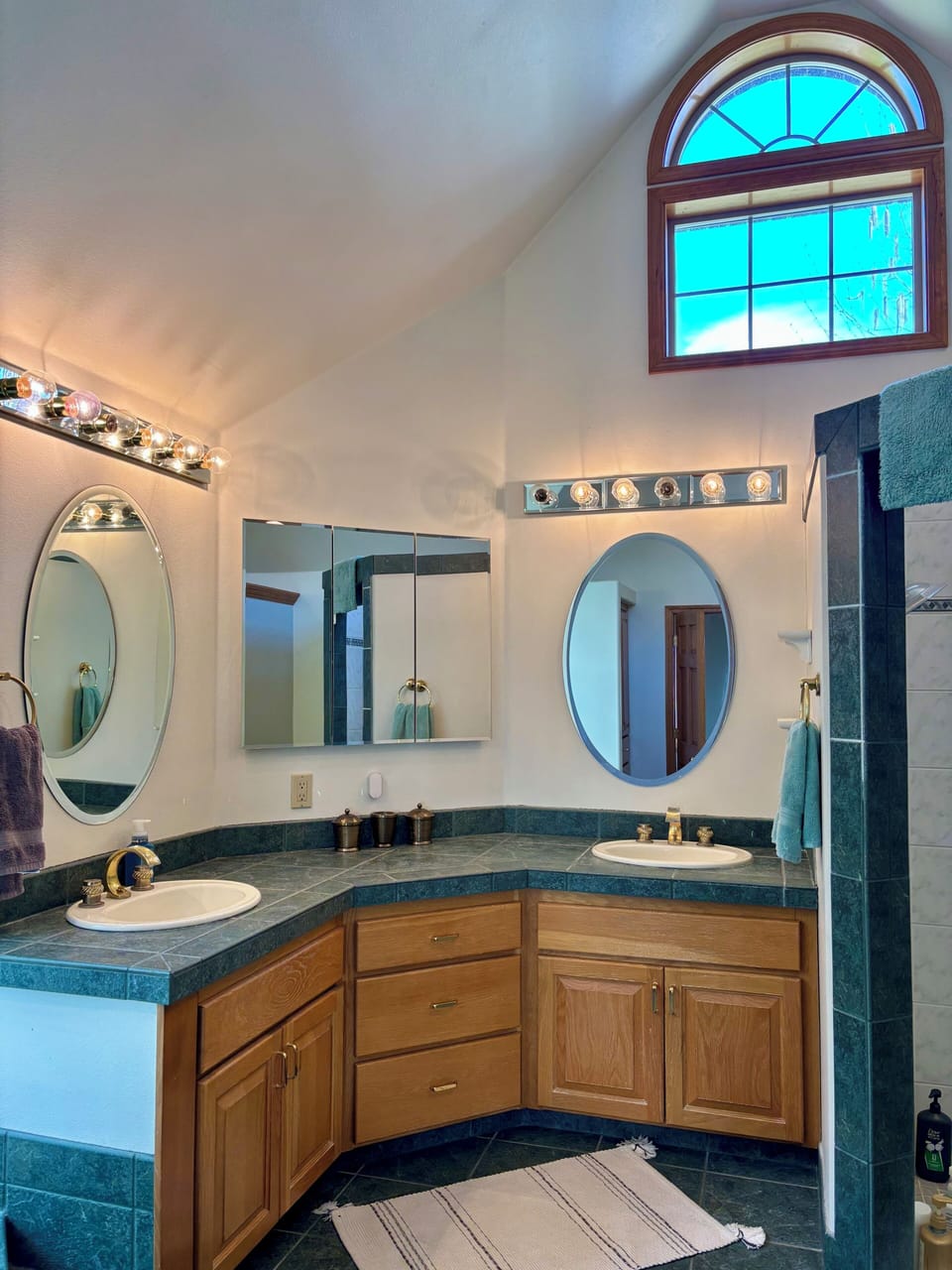 Master bath with dual vanity, dual shower head, jetted tub & walk in closet