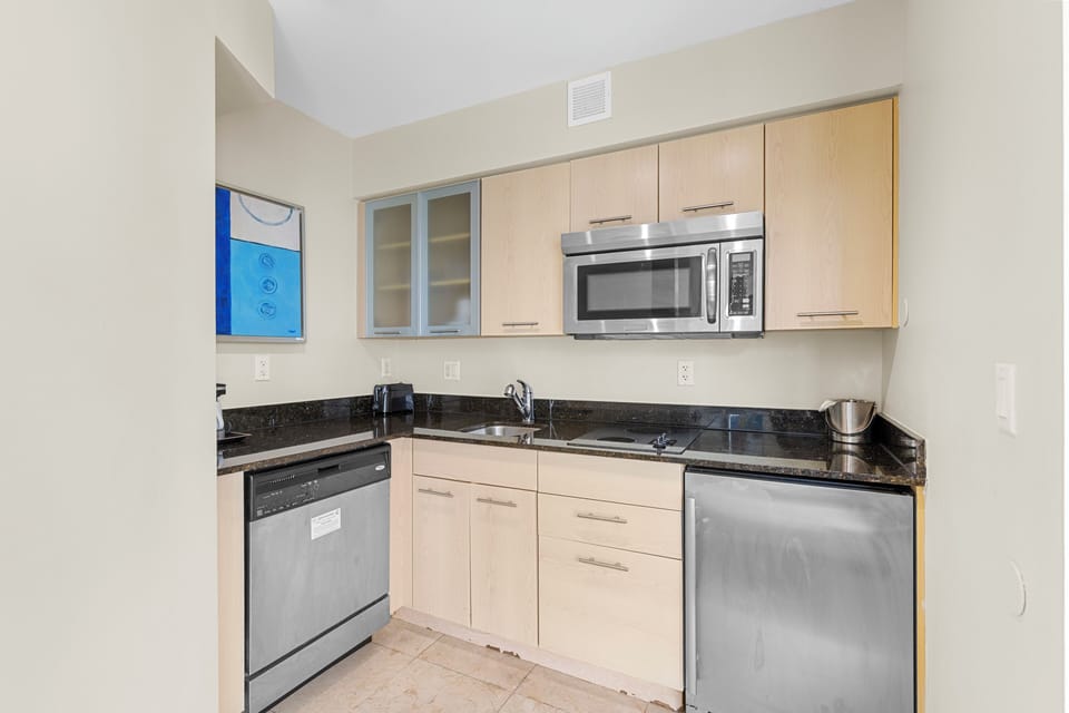 Deluxe Condo, Ocean View | Private kitchen | Coffee/tea maker