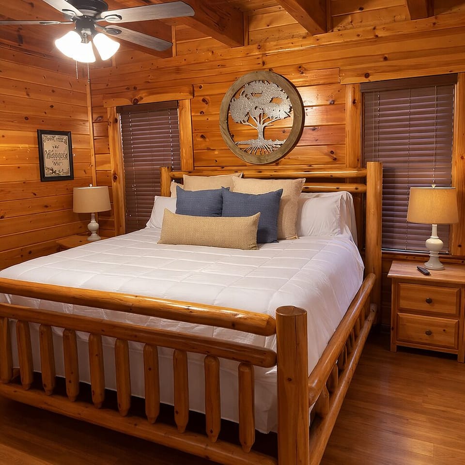 Private king suite with en-suite bath — cozy comfort after a day in the Smokies.