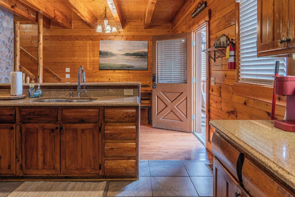 Rustic cabin character meets everyday convenience in this inviting mountain kitchen.