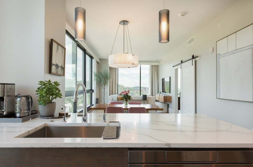 Kitchen with sink and breakfast bar