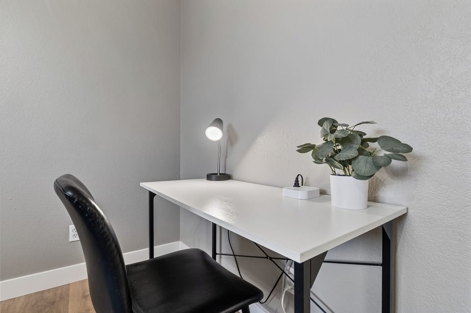 Functional workspace with a desk and seating