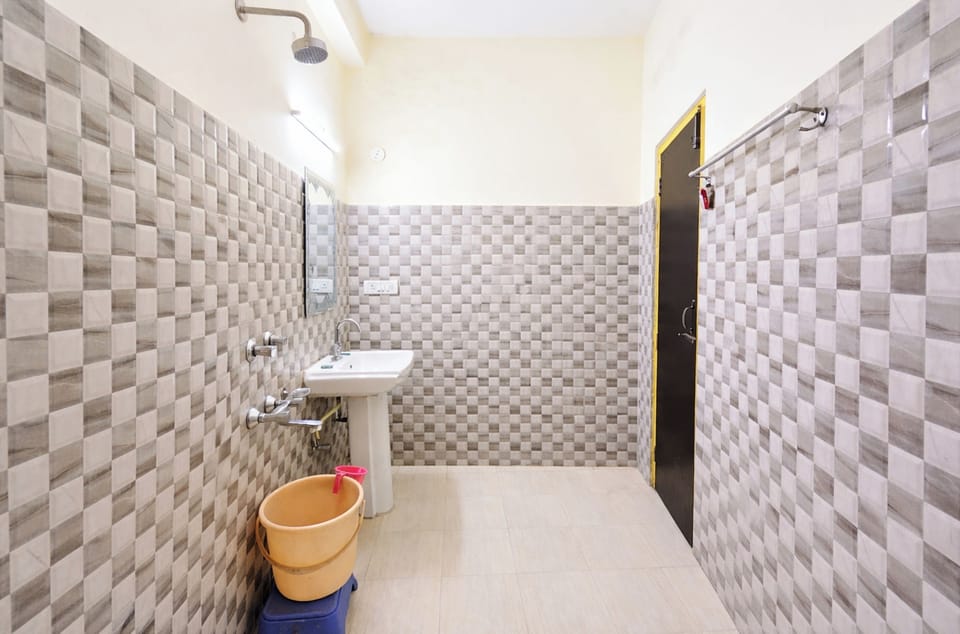 Shower, rainfall showerhead, slippers, towels